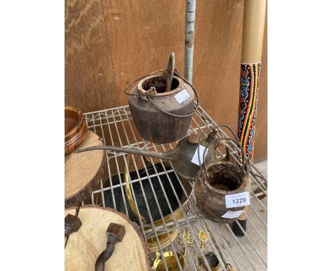 TWO VINTAGE CAST IRON GLUE POTS AND A PUMP ACTION OIL CAN 