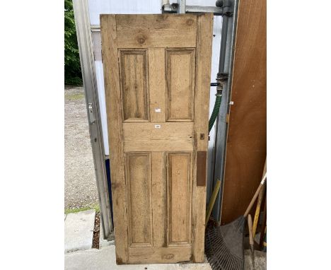 A VINTAGE INTERNAL PINE DOOR WITH COPPER PUSH PLATES 
