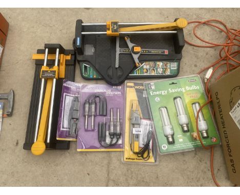 AN ASSORTMENT OF TOOLS TO INCLUDE TILE CUTTERS, BULBS AND SPARK PLUG ANALYSERS ETC 