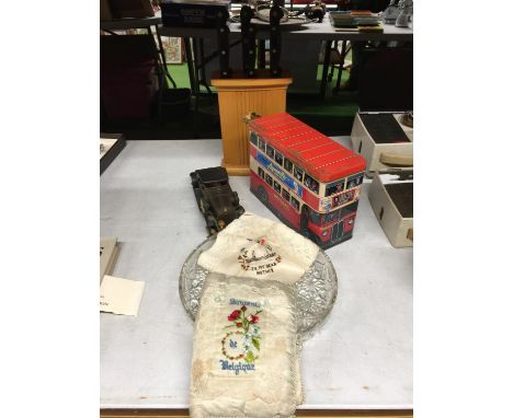 A HAND EMBROIDERED VINTAGE HANDKERCHIEF AND BOOK COVER, A GLASS NIBBLES DISH, VINTAGE BUS TIN, CAR AND KNIFE SET 