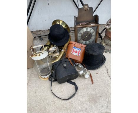 AN ASSORTMENT OF ITEMS TO INCLUDE A BRASS TROMBONE, A TOP HAT AND A CLOCK ETC 