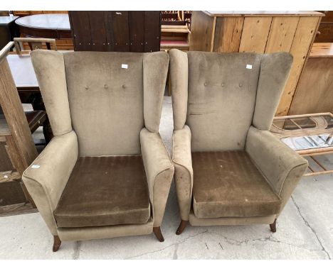 A PAIR OF 1970'S BUTTON-BACK WINGED EASY CHAIRS 