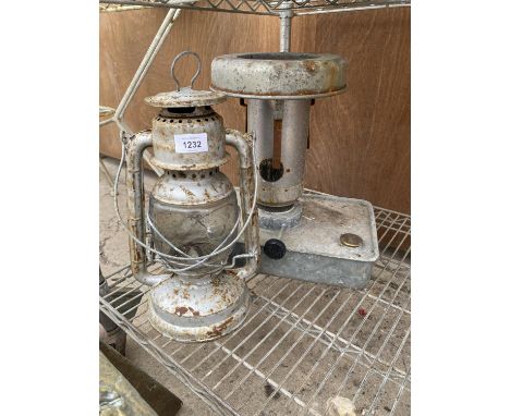 A VINTAGE PARAFIN TILLEY LAMP AND A VINTAGE ELTEX GREENHOUSE HEATER 