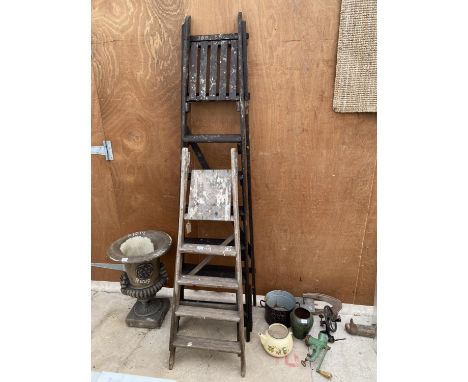A VINTAGE WOODEN SIX RUNG STEP LADDER AND A FURTHER FOUR RUNG WOODEN STEP LADDER 