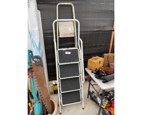 A FOUR RUNG STEP LADDER AND A FURTHER FIVE RUNG BELDRAY STEP LADDER 