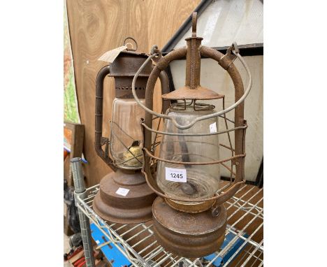 TWO VINTAGE OIL STORM LAMPS 
