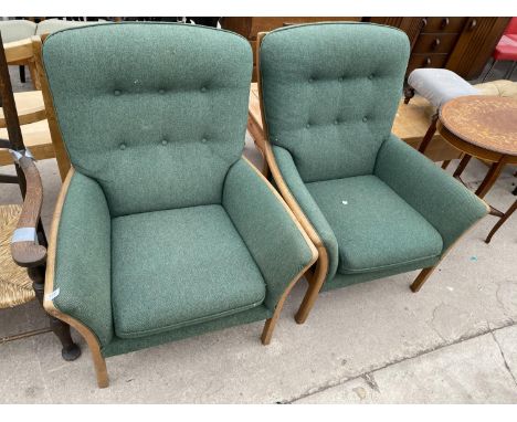 A PAIR OF ERCOL STYLE BUTTON-BACK FIRESIDE CHAIRS 