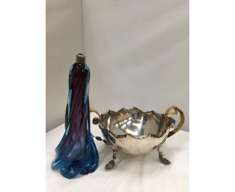 A SILVER PLATED TWISTED FOOTED , FLUTED BOWL H:16CM W:33CM  AND A COLOURED GLASS OIL LAMP H: 30CM 
