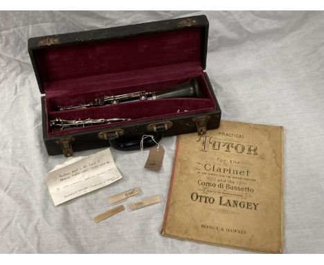 A BOXED BOOSEY AND HAWKES CLARINET 77 BOEHM SYSTEM WITH SPARE REEDS AND 'PRACTICAL TUTOR FOR THE CLARINET' BOOK 