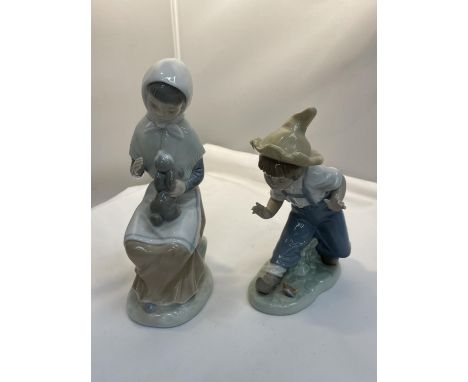TWO NAO FIGURES TO INCLUDE A GIRL WITH A RABBIT  AND A YOUNG BOY 