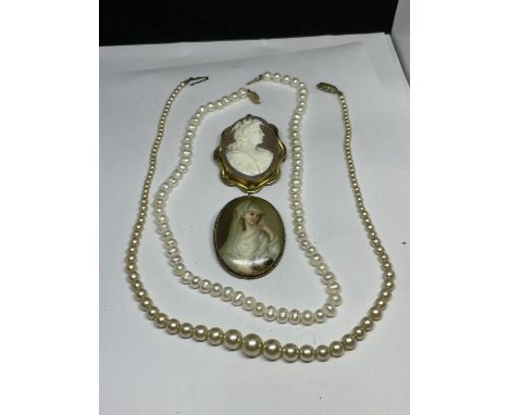 TWO BROOCHES ONE A CAMEO AND THE OTHER CERAMIC WITH TWO STRINGS OF PEARLS 