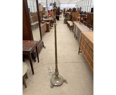 A VICTORIAN BRASS OIL LAMP STAND ON CLAW FEET, CONVERTED TO ELECTRICITY 