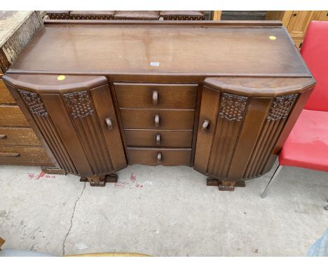 AN OAK ART DECO STYLE SIDEBOARD 54" WIDE BEARING LABEL R H TUCKER LTD 1141 NEWINGTON BUTTS 