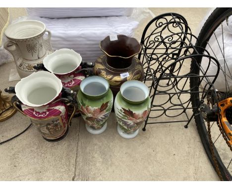 AN ASSORTMENT OF CERAMIC VASES AND A METAL WINE RACK 
