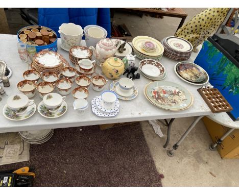 A LARGE QUANTITY OF CERAMIC ITEMS TO INCLUDE TEAPOTS, PLATES AND TRIOS ETC 