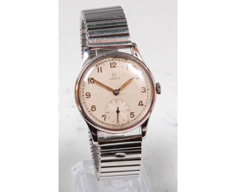A gents Omega steel cased wristwatch, circa 1975, having a signed silvered dial with luminous Arabic numerals, subsidiary sec
