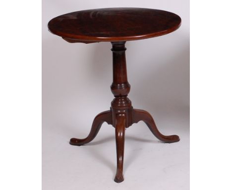 A George III mahogany pedestal tripod table, the one-piece circular tilt-top on a gun barrel turned urn column, dia.65.5cm, h