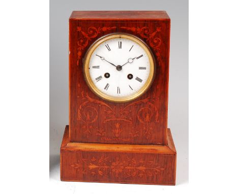 A late 19th century rosewood cased mantel clock, having white enamel dial (with numerous hairlines), twin winding holes for a