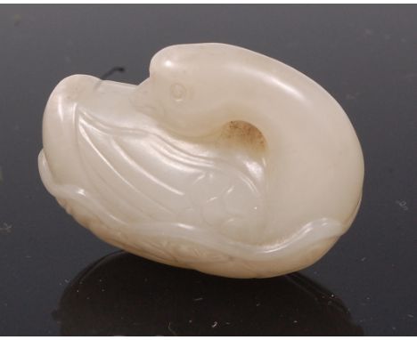 A Chinese carved celadon jade pendant as a goose, 4.5cm