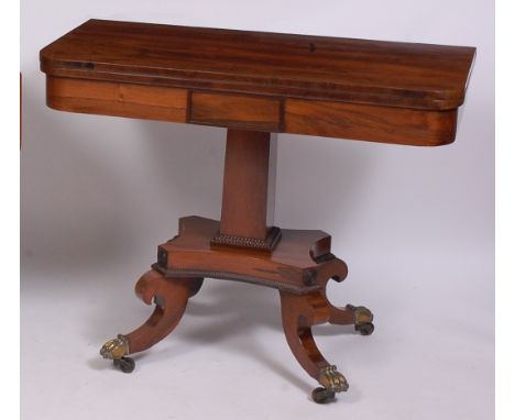 A Regency rosewood pedestal card table, having a D-shaped foldover top opening to reveal baize lined playing surface, all on 