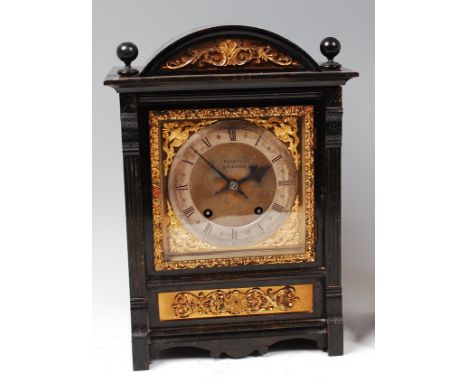 A late Victorian ebonised cased mantel clock, the silvered dial signed Boxell of Brighton, having silvered chapter ring, gilt