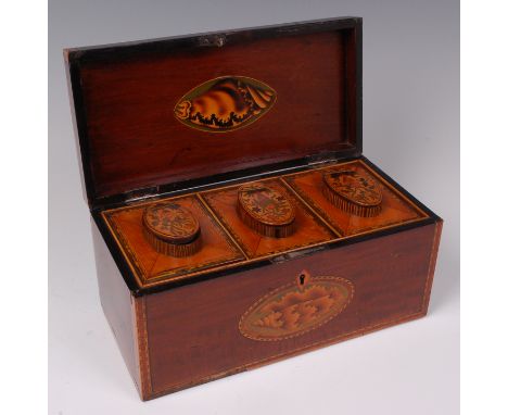 An early 19th century mahogany and inlaid fitted tea caddy, of rectangular form, the front and top marquetry inlaid with a si