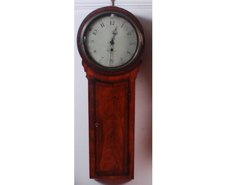 An early 19th century mahogany droptrunk wall clock, the circular white enamel dial (dia. 12") signed Yarmouth, having Arabic