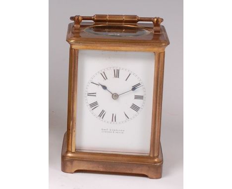 A late 19th century lacquered brass carriage clock, the white enamel dial signed Charles Shapland, London & Paris, having vis