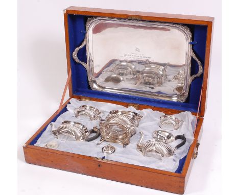 A good Edwardian silver six piece tea and coffee service, in fitted oak case, comprising; twin handled tray with presentation