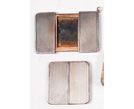 A pair of ST Dupont of Paris travelling picture lockets, one with pendant loop, each of engine turned rectangular form with p