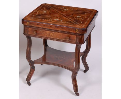 A circa 1900 rosewood and inlaid envelope card table, the four section top with arabesque boxwood and ivory inlays decorated 