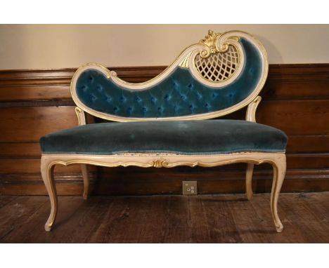 A white painted Rococo style small sofa in deep buttoned upholstery on cabriole supports. H.93 W.106 D.42cm 