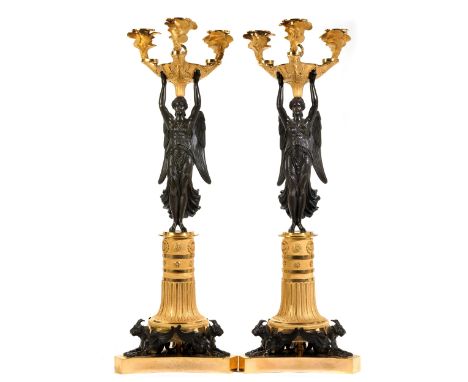 Paar qualitätvolle Empire-Kandelaber,Philippe Thomire (1751 - 1843), zug.Höhe: 66,5 cm. Paris, um 1800.Bronze, gegossen, zise