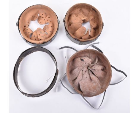 3x German Steel Helmet Liners, accompanied by a German steel helmet liner band. Sold as viewed