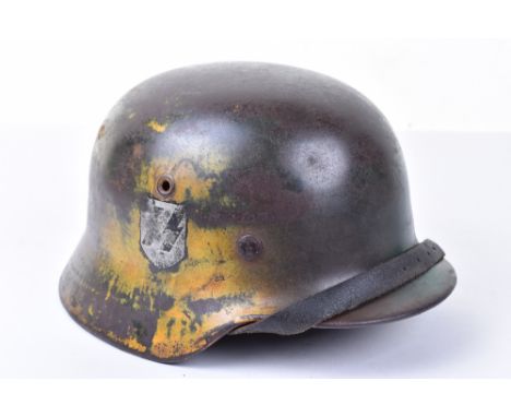 WW2 German Waffen-SS Steel Combat Helmet, being a M-40 pattern shell with later applied SS single decal and remains of camouf