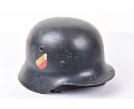 WW2 German Luftwaffe Steel Combat Helmet, being a M-40 pattern shell with dark blue / grey paint finish to the exterior. Late
