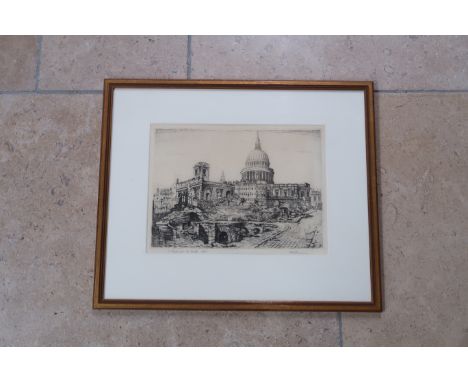 After Emerson H Groom (1890-1983): St Paul's from the South, 1943,  an etching, 28 by 21cm, framed and glazed.