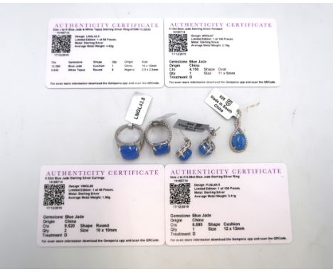 A group of blue jade silver jewellery to include a pendant, a pair of earrings, a ring size J 1/2, a ring with white topaz si