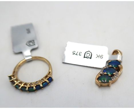 A 9ct gold opal triplet eight stone ring, size K. Together with a 9ct opal triplet and diamond pendant. Weight 4.40 grams