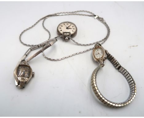 A 14ct white gold cased, vintage Lady Hamilton cocktail watch set with diamonds to the scroll lugs, numbered to the back 8965