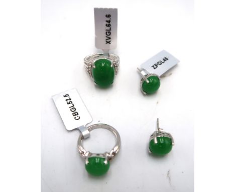 A jade and white topaz ring size M. A jade cabochon single stone ring , size  J 1/2 and ear studs. Stated silver. Weight 15.0