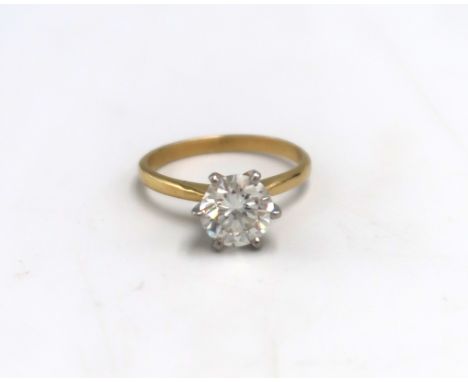 An 18ct gold, platinum and diamond solitaire ring, the stone of approximately 1.5ct, size L/M, 3.1g - Estimated J/K colour. V