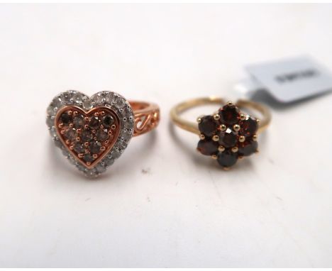 Two 9ct gold diamond rings. A cognac diamond circular cluster, diamond weight 1.01cts, Size K. A champagne and white diamond 