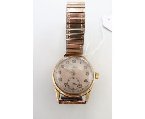 A vintage Omega 9ct gold cased wristwatch, manual wind, 3.2cm across bezel, on plated bracelet strap, appears to run but stop