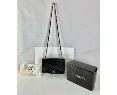 CHANEL vintage black quilted lambs leather single flap bag with gold coloured hardware, chain strap and burgundy leather lini