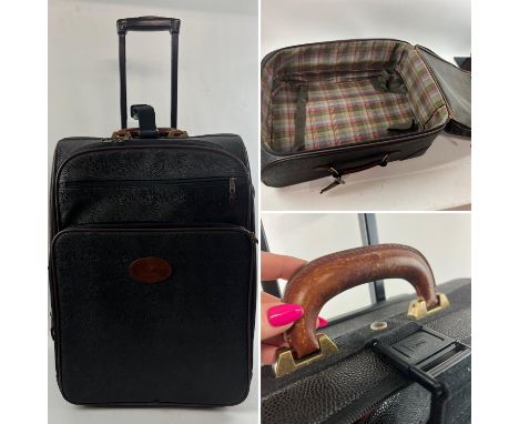 MULBERRY 1990s Vintage Scotch Grain black and brown travel bag, Cabin bag, Pull Trolley. Serial number 049242Tartan lining wi