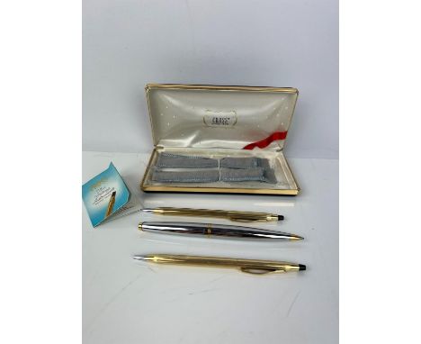 Boxed set of three vintage 1960s CROSS pens. Two biros in 12k gold filled casings and one silver and gold coloured biro. Cond