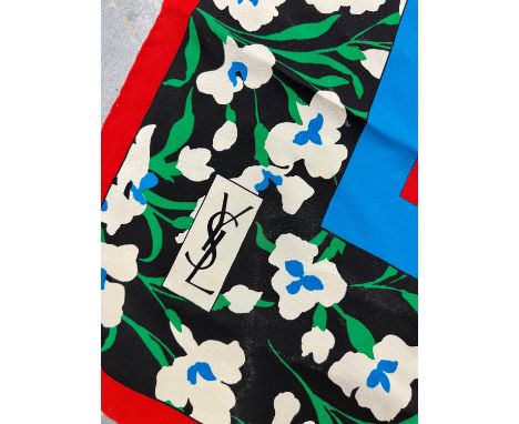 YSL (YVES SAINT LAURENT) 1970s vintage silk scarf. Floral pattern in black,white,red,blue,green. Hand rolled edges. late 1970