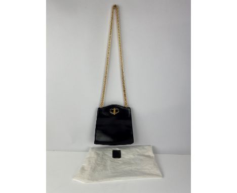 A quality DUNHILL vintage navy/blue leather handbag with heavy gold coloured long chain handle and twist lock fastening. With