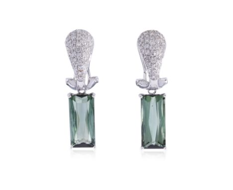 A PAIR OF TOURMALINE AND DIAMOND EARRINGS
Featuring a pair of rectangular tourmalines weighing approximately 6.0 Cts, mounted